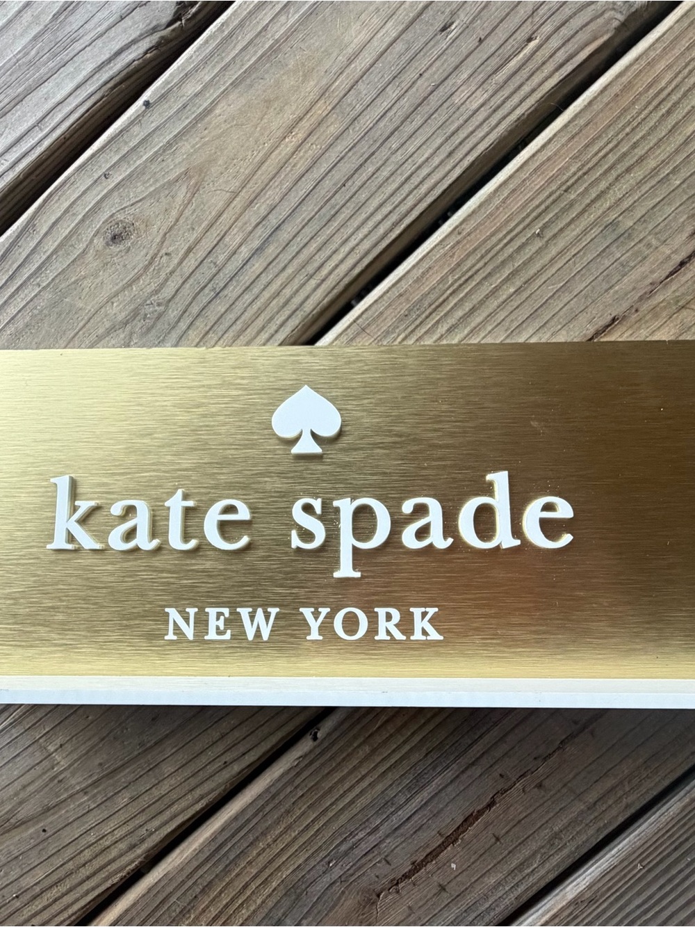 kate spade Gold and White Logo Plaque - New York